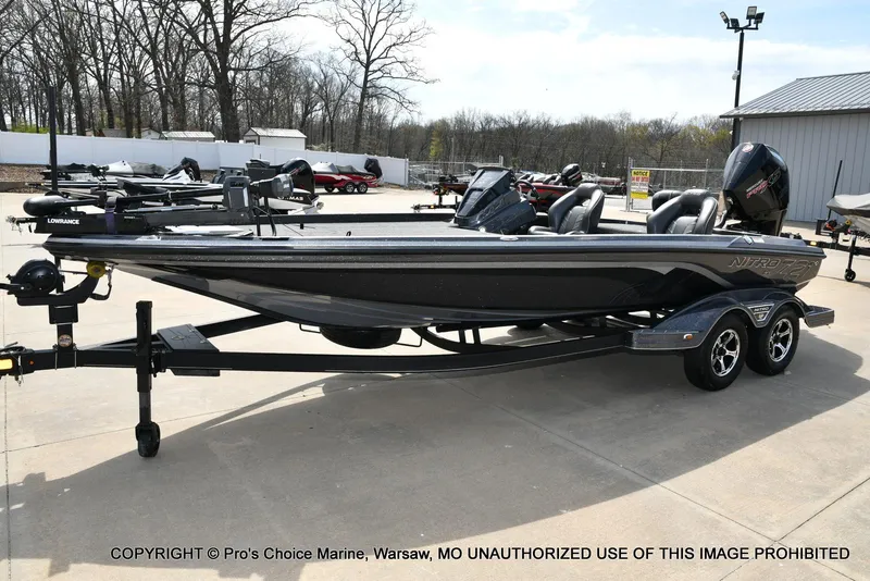 Slide: The Image of 2022 Nitro Z21 XL Pro boat on trailer, parked outdoors. - 30