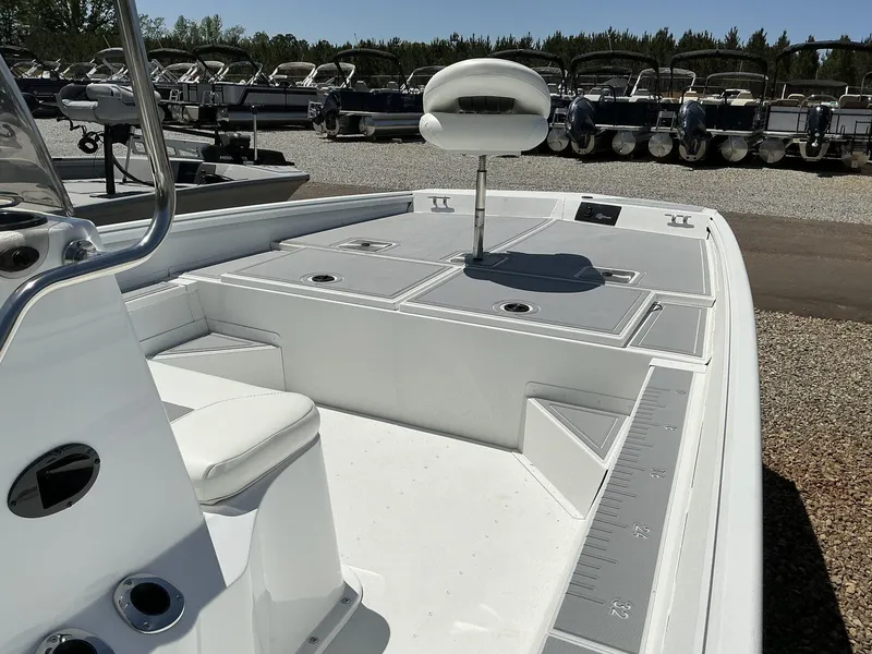 Slide: The Image of 2025 G3 Bay 20 boat interior with seating and storage compartments. - 8