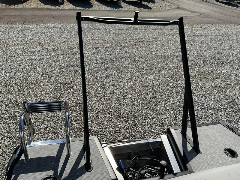 Slide: The Image of Rear view of 2025 Viaggio Lago V 20 C boat with ladder and frame on gravel. - 12