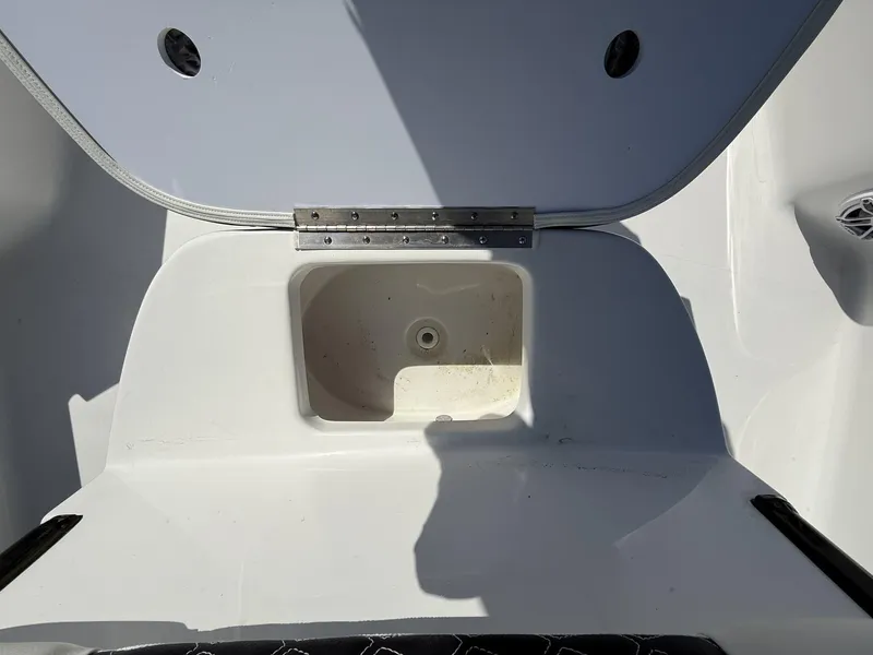 Slide: The Image of Open storage compartment on 2025 Tidewater 2410 Bay Max boat. - 11