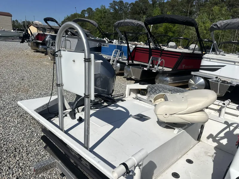 Slide: The Image of 2022 G3 Bay 17 BAY boat in a gravel lot with other boats. - 12