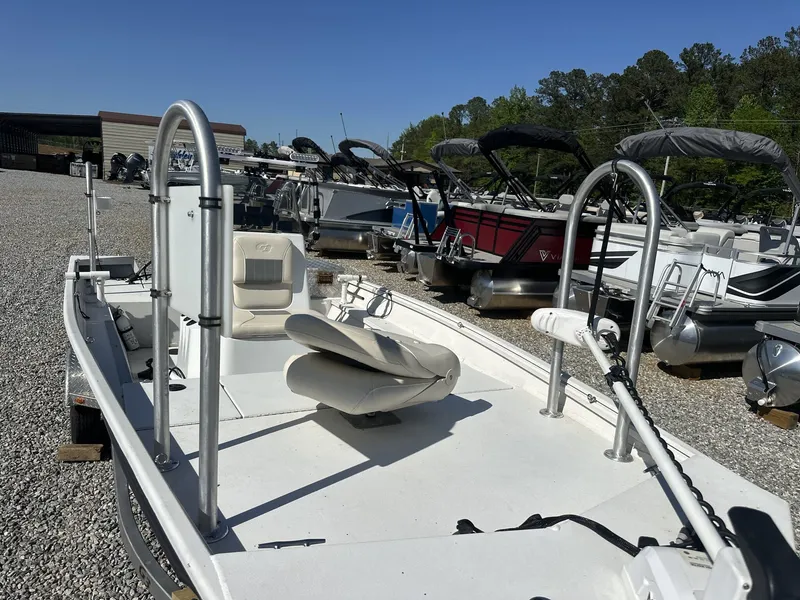 Slide: The Image of 2022 G3 Bay 17 BAY boat in a marina, surrounded by other boats. - 13