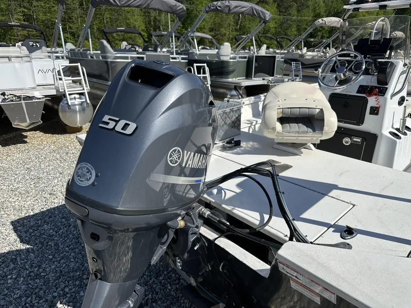 Slide: The Image of Boat with Yamaha 50 outboard motor, G3 Bay 17 BAY model, 2022, in a marina setting. - 14