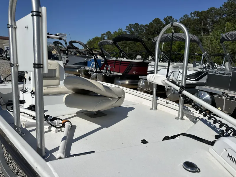 Slide: The Image of 2022 G3 Bay 17 BAY boat with seating, docked alongside other boats. - 3