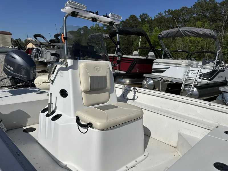 Slide: The Image of 2022 G3 Bay 17 BAY boat with Yamaha engine, parked among other boats. - 9