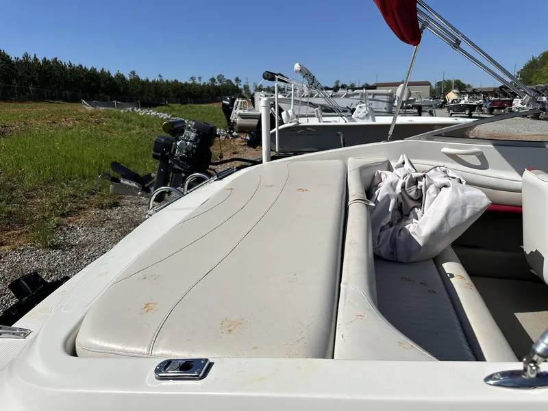 Slide: The Image of 2007 Caravelle 182 186 boat interior with seating and outdoor storage area. - 9