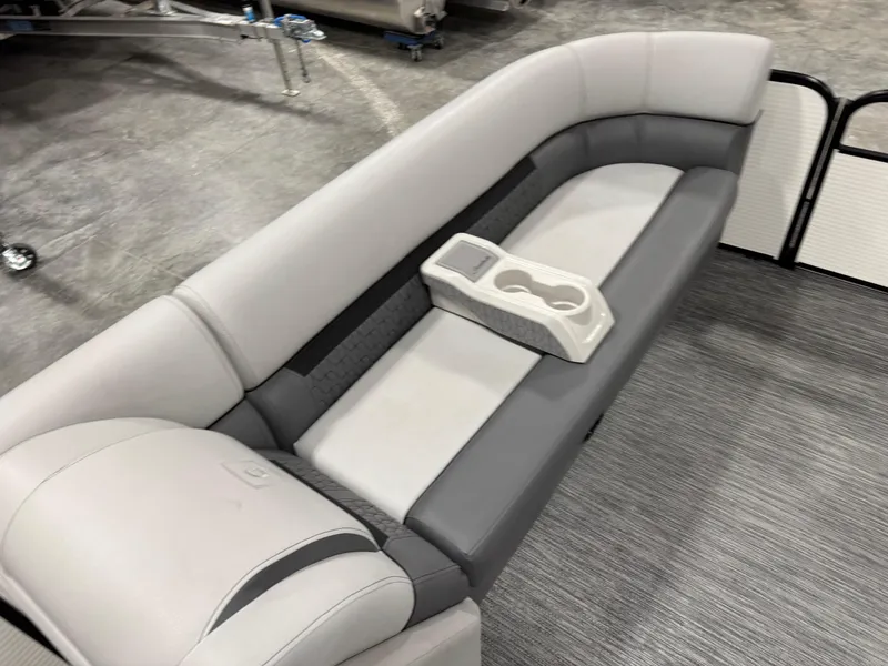 Slide: The Image of Luxurious seating on 2023 Sweetwater 2286 pontoon boat with cup holders. - 10