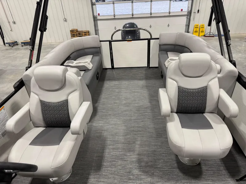 Slide: The Image of 2023 Sweetwater 2286 boat interior with plush seating and modern design. - 8