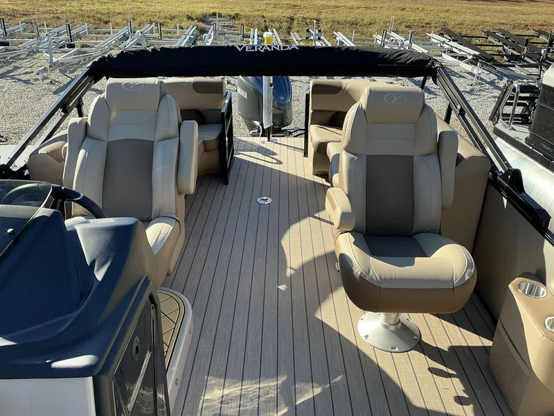 Slide: The Image of 2025 Veranda Relax Series 22RC pontoon boat interior with luxurious seating. - 18