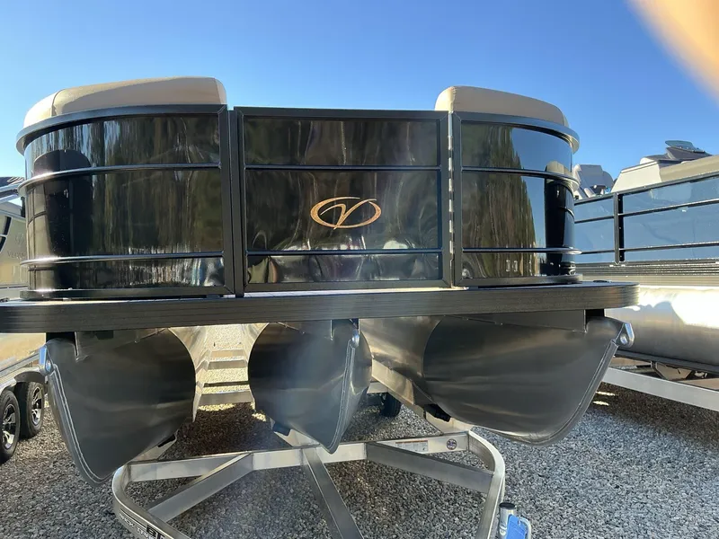 Slide: The Image of 2025 Veranda Relax Series 22RC pontoon boat on trailer, sunny day. - 4