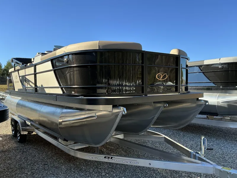 Slide: The Image of 2025 Veranda Relax Series 22RC pontoon boat on trailer, sleek design, sunny day. - 5