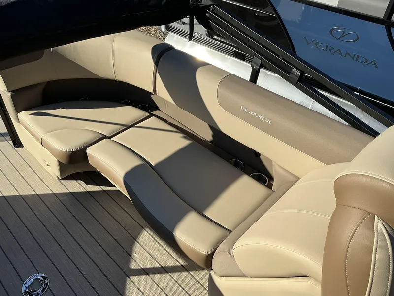 Slide: The Image of Luxurious seating on 2025 Veranda Relax Series 22RC boat, featuring elegant beige upholstery. - 7