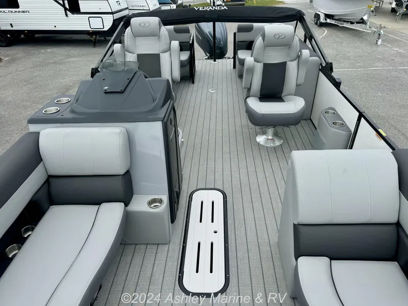 Slide: The Image of 2025 Veranda Relax Series 22RC pontoon boat interior with gray seating and modern design. - 7