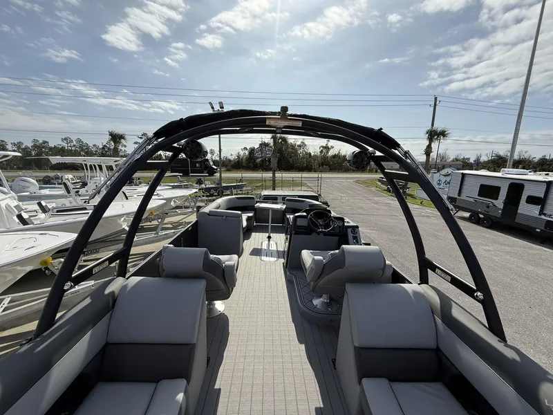 Slide: The Image of 2025 Veranda Relax Series VR25RC pontoon boat with spacious seating and modern design. - 13