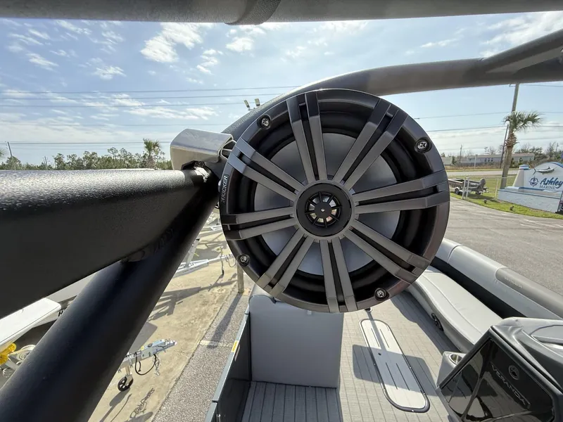 Slide: The Image of Close-up of a speaker on a 2025 Veranda Relax Series VR25RC boat. - 14