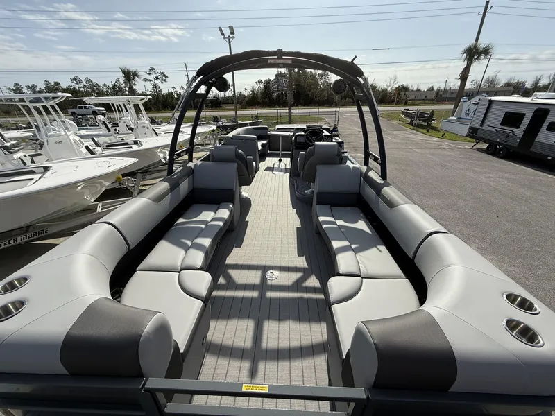 Slide: The Image of 2025 Veranda Relax Series VR25RC pontoon boat with spacious seating and modern design. - 15