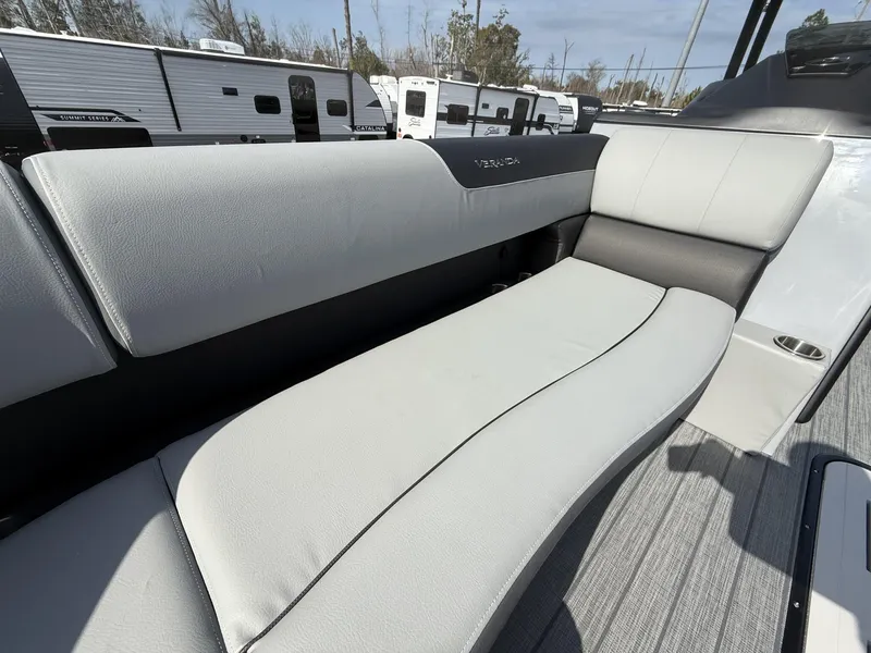 Slide: The Image of 2025 Veranda Relax Series VR25RC boat interior with plush seating and modern design. - 6