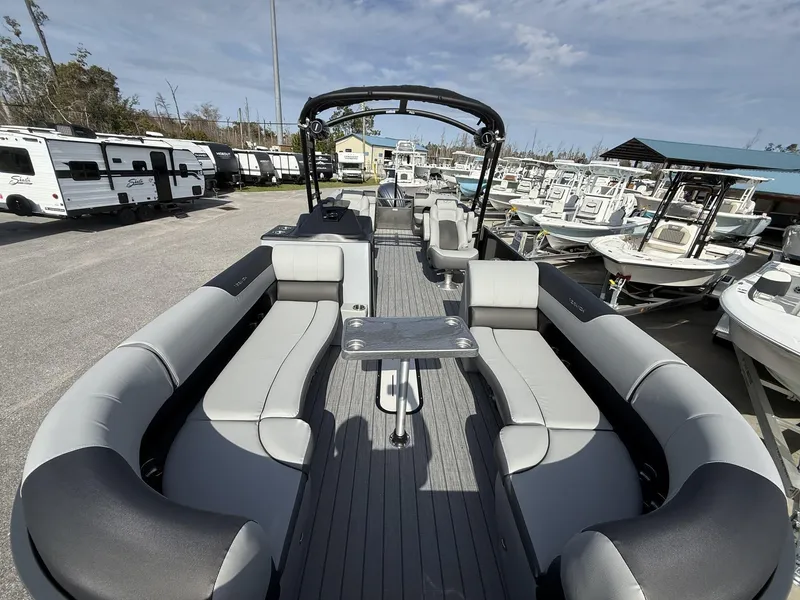 Slide: The Image of 2025 Veranda Relax Series VR25RC pontoon boat with spacious seating and sleek design. - 7