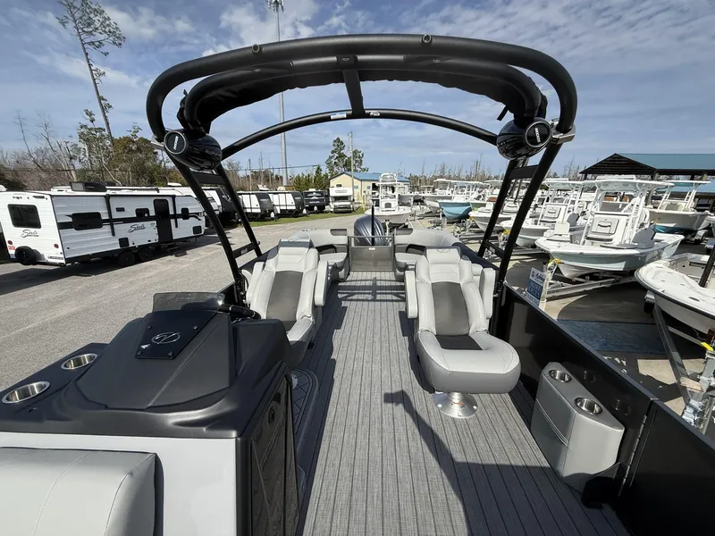 Slide: The Image of 2025 Veranda Relax Series VR25RC pontoon boat with luxurious seating and modern design. - 9