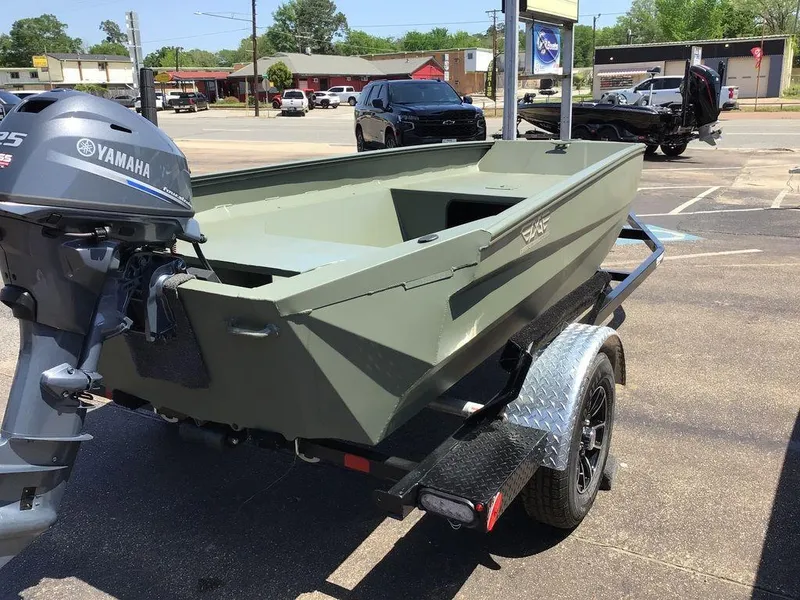 Slide: The Image of 2025 Edge Duck Boats 550-SP on trailer with Yamaha outboard motor in parking lot. - 1