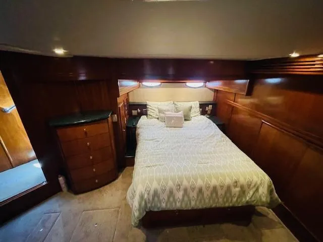 Slide: The Image of Luxurious bedroom interior of 2000 Carver 530 Voyager Pilothouse yacht. - 38