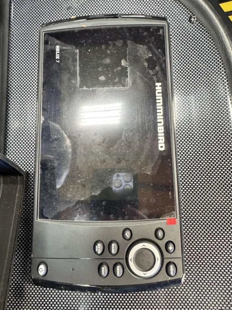 Slide: The Image of Humminbird Helix 7 fish finder on Triton 18 TrX, 2016 model. - 24