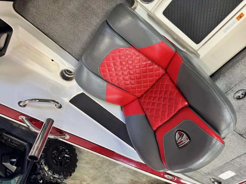 Slide: The Image of Red and gray seat of 2016 Triton 18 TrX boat with quilted design. - 30