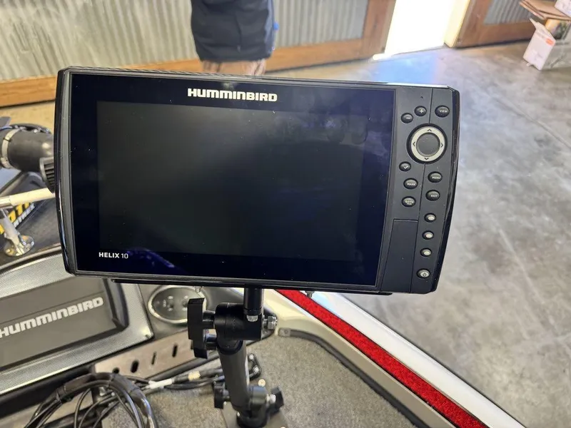 Slide: The Image of Humminbird Helix 10 fish finder on 2016 Triton 18 TrX boat dashboard. - 36