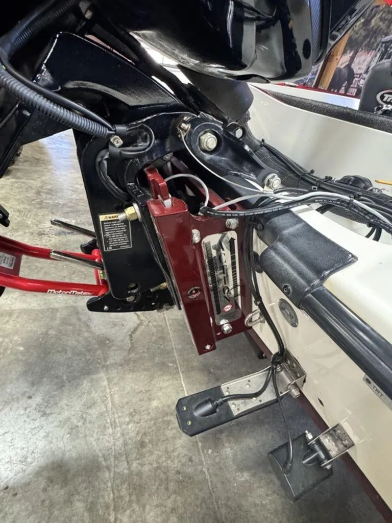 Slide: The Image of 2016 Triton 18 TrX boat engine mount and wiring detail. - 9