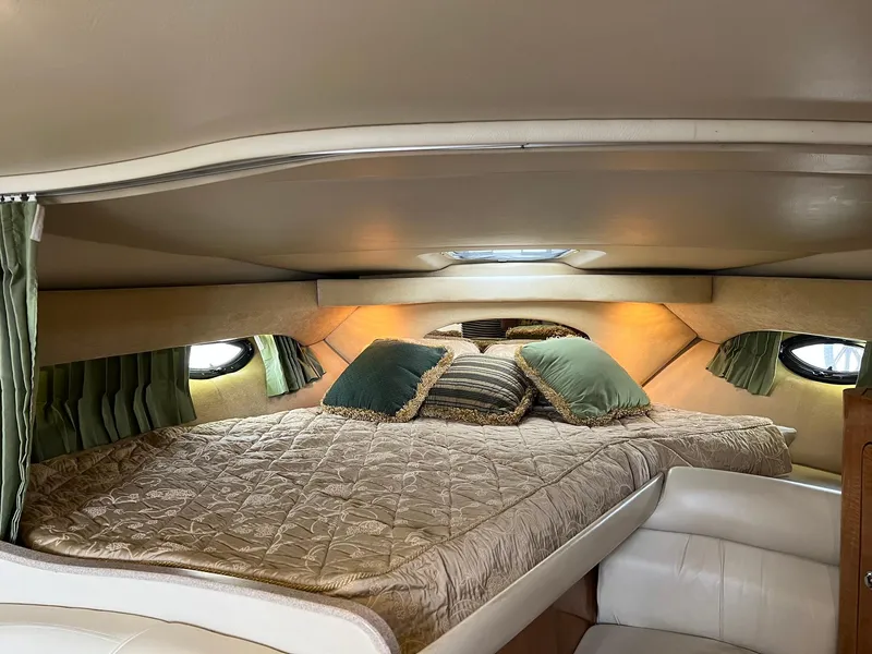 Slide: The Image of Luxurious cabin interior of 2003 Regal Commodore 3260 yacht with cozy bedding. - 15