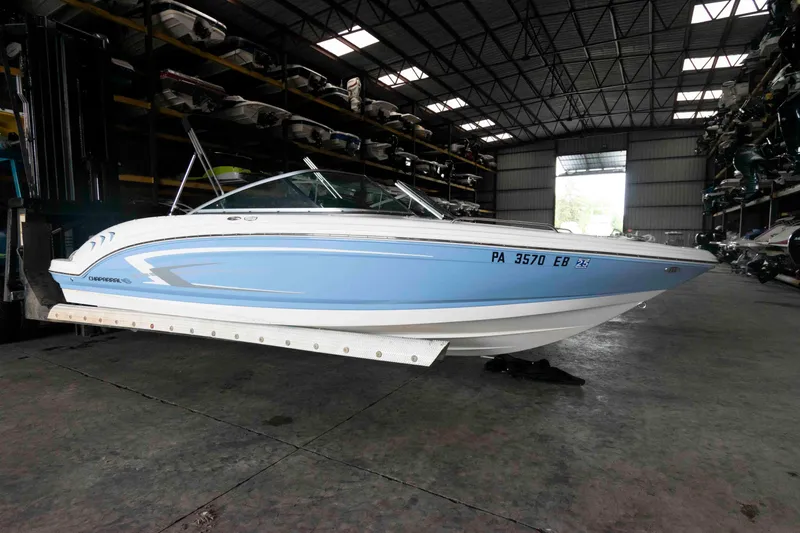 The Image of 2022 Chaparral 23 SSi boat in storage facility, side view. - 0