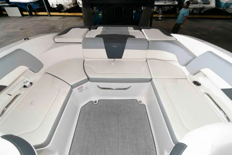 Slide: The Image of 2022 Chaparral 23 SSi boat interior with spacious seating and modern design. - 11
