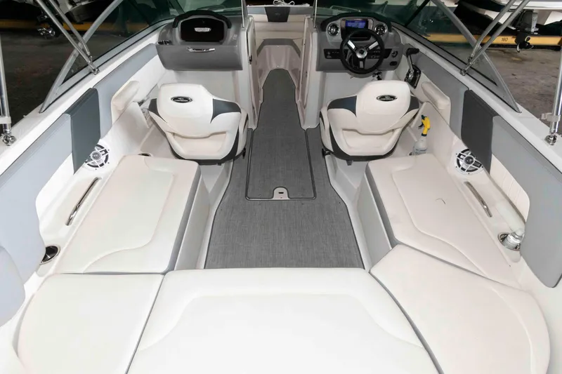 Slide: The Image of 2022 Chaparral 23 SSi boat interior with modern seating and steering console. - 5