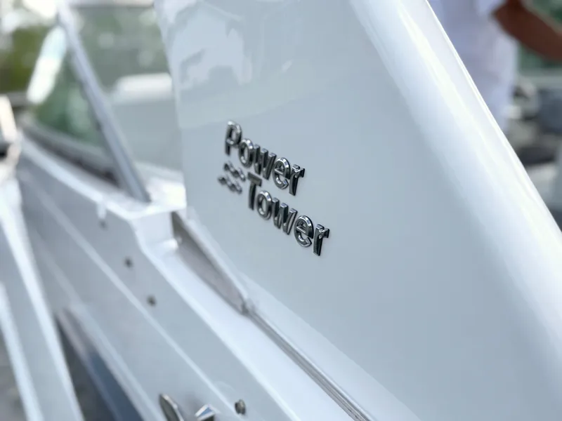 Slide: The Image of 2024 Regal 26 XO boat with Power Tower feature, close-up view. - 36