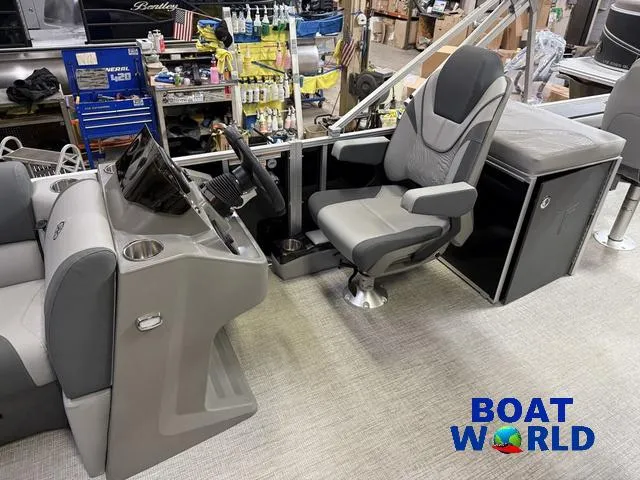 Slide: The Image of Interior of 2025 Tahoe Geofish 2385 boat with modern seating and controls. - 12