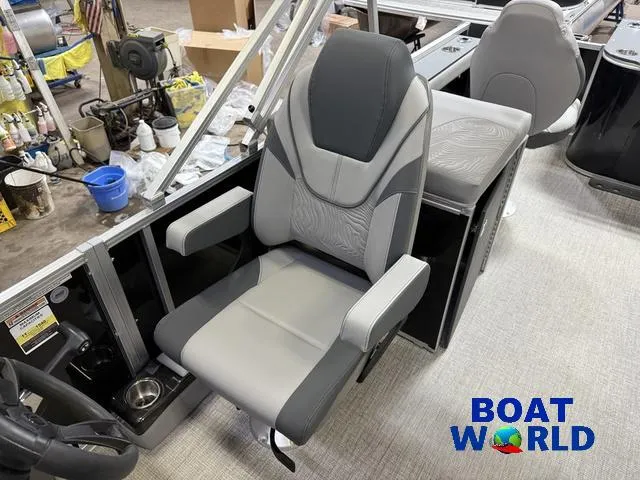 Slide: The Image of 2025 Tahoe Geofish 2385 boat seat with modern design in showroom setting. - 13