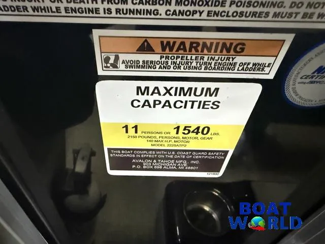 Slide: The Image of Warning label on Tahoe Geofish 2385 boat showing maximum capacity and safety instructions. - 18