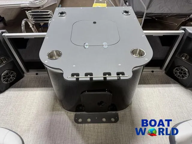 Slide: The Image of 2025 Tahoe Geofish 2385 Rear Fish boat interior with fishing station and cup holders. - 25