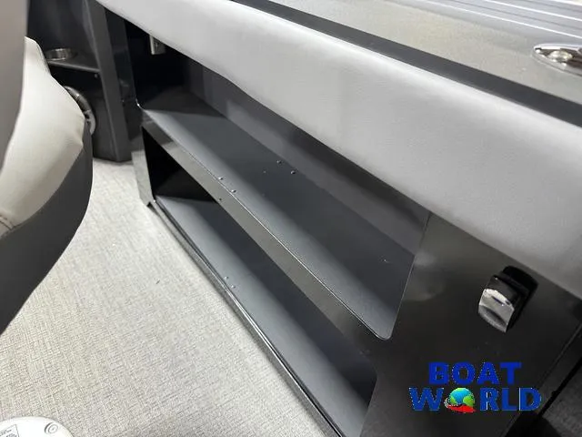 Slide: The Image of Interior storage of 2025 Tahoe Geofish 2385 boat, featuring sleek shelving and modern design. - 33