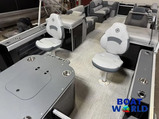 Slide: The Image of 2025 Tahoe Geofish 2385 boat interior with seating and fishing setup. - 38