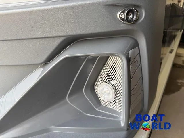 Slide: The Image of Close-up of 2025 Tahoe Geofish 2385 Rear Fish boat detail with speaker and camera. - 45