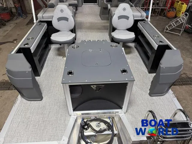 Slide: The Image of 2025 Tahoe Geofish 2385 boat interior with seating and fishing setup. - 7