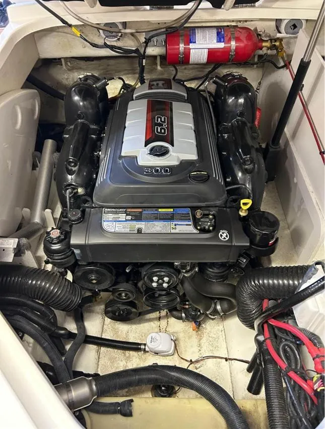 Slide: The Image of Engine compartment of a 2016 Sea Ray SLX 230 boat, featuring a 6.2L engine. - 5