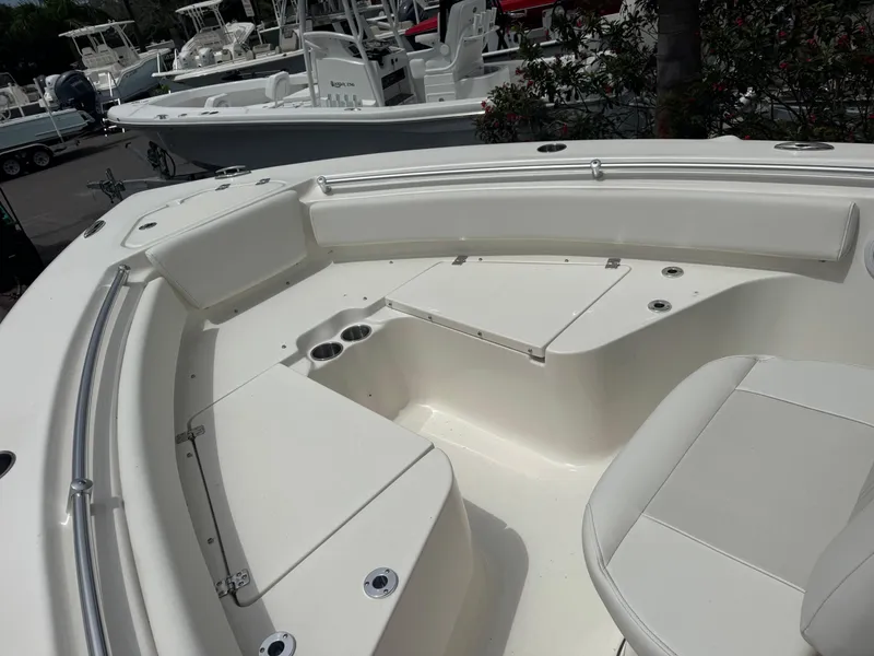 Slide: The Image of 2025 Key West 219 FS boat interior with spacious seating and cup holders. - 20