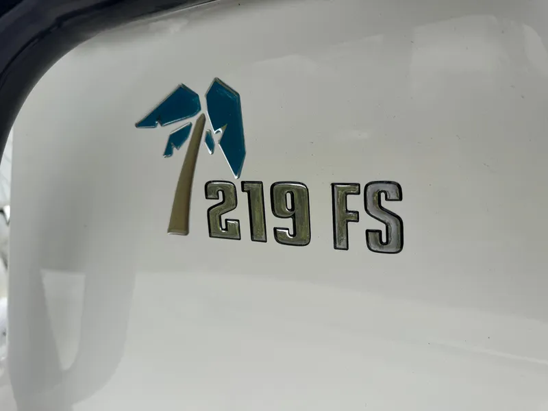 Slide: The Image of 2025 Key West 219 FS boat logo on white surface. - 26
