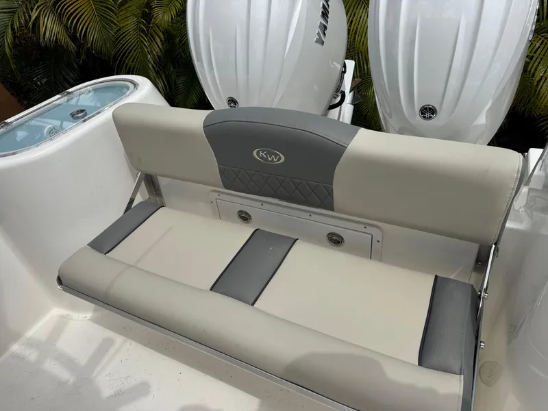 Slide: The Image of 2025 Key West 260 boat seat with dual Yamaha engines in the background. - 14