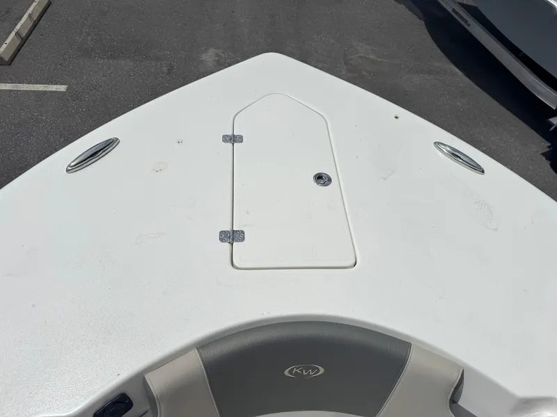 Slide: The Image of Bow of 2025 Key West 260 boat with storage hatch and cleats. - 19
