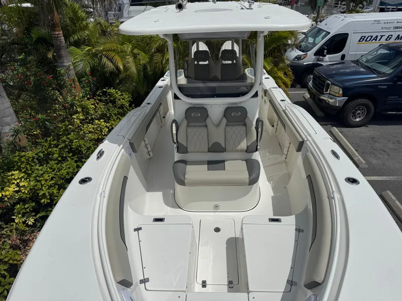 Slide: The Image of 2025 Key West 260 boat with spacious seating and sleek design. - 22