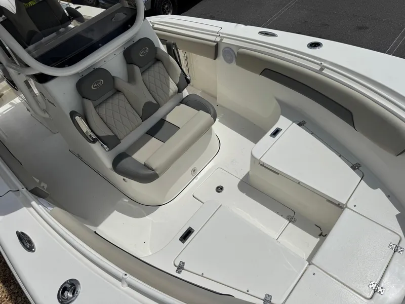 Slide: The Image of 2025 Key West 260 boat interior with seating and storage compartments. - 23