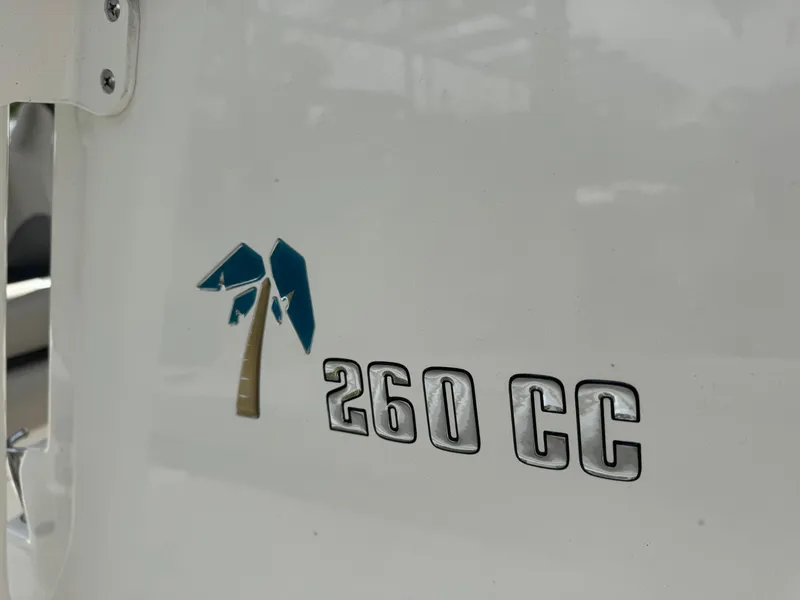 Slide: The Image of Key West 260 CC boat logo, 2025 model, featuring a palm tree design. - 28